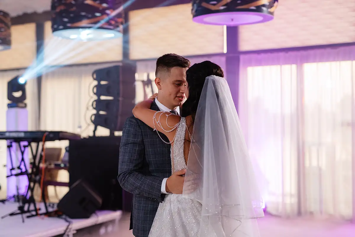 First dance of bride and groom with DJ setup